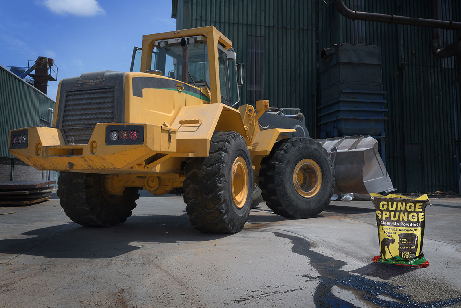 A yellow tractor parked outside a building

AI-generated content may be incorrect.