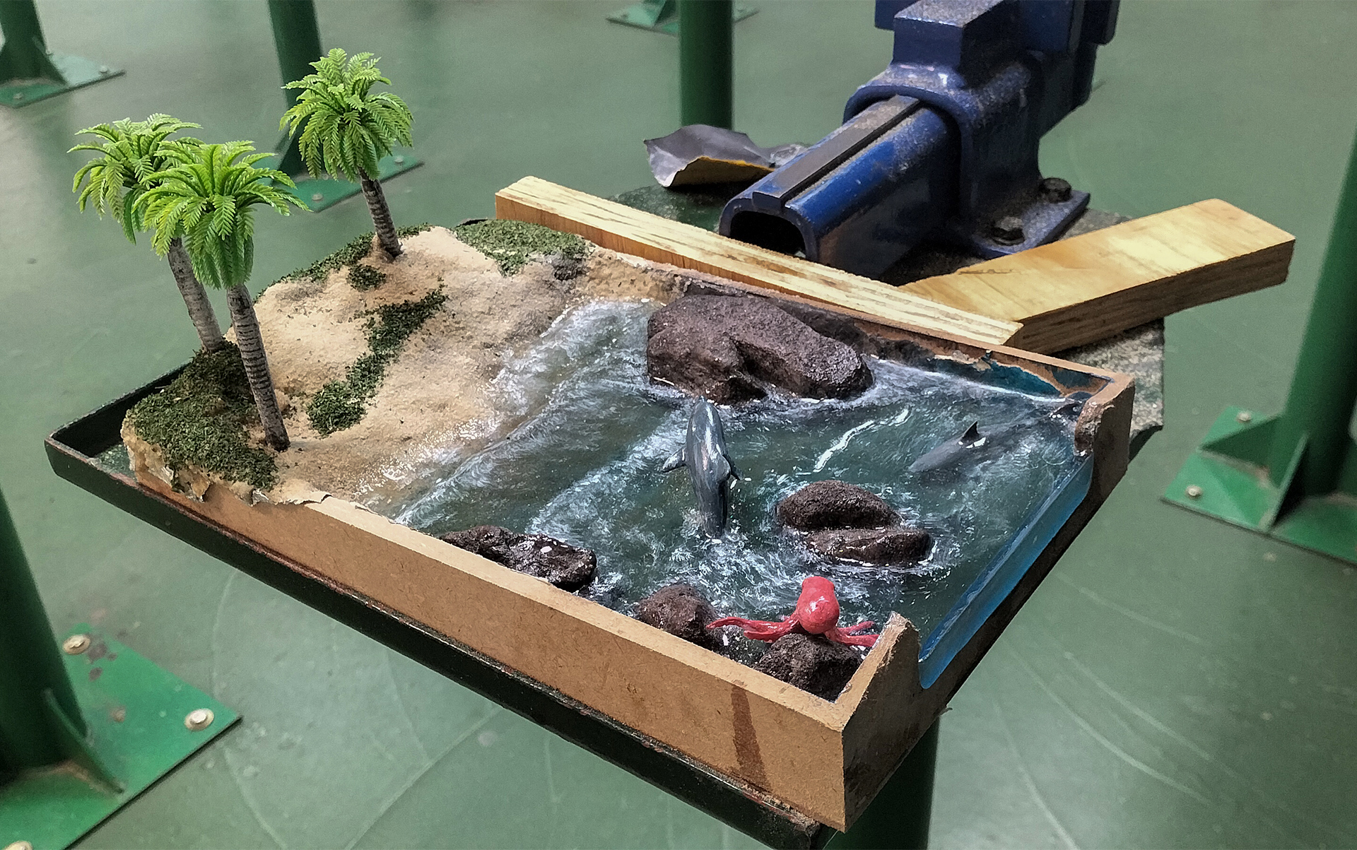 A model of a river with rocks and trees

AI-generated content may be incorrect.